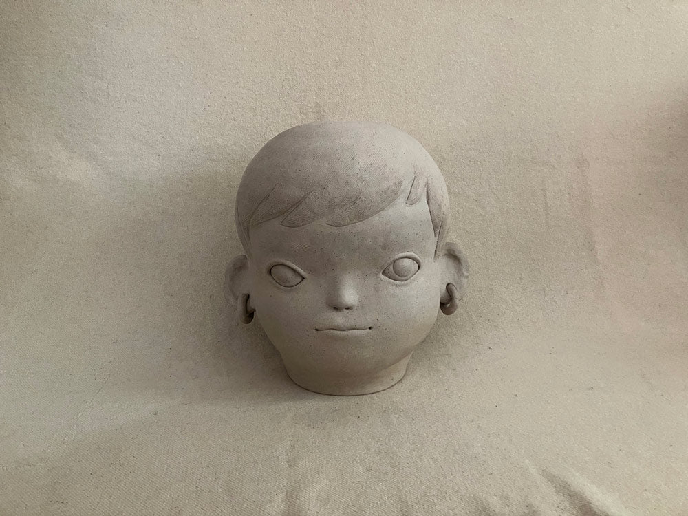 Large Boy with Earrings