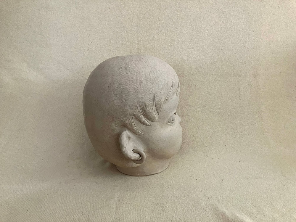 Large Boy with Earrings