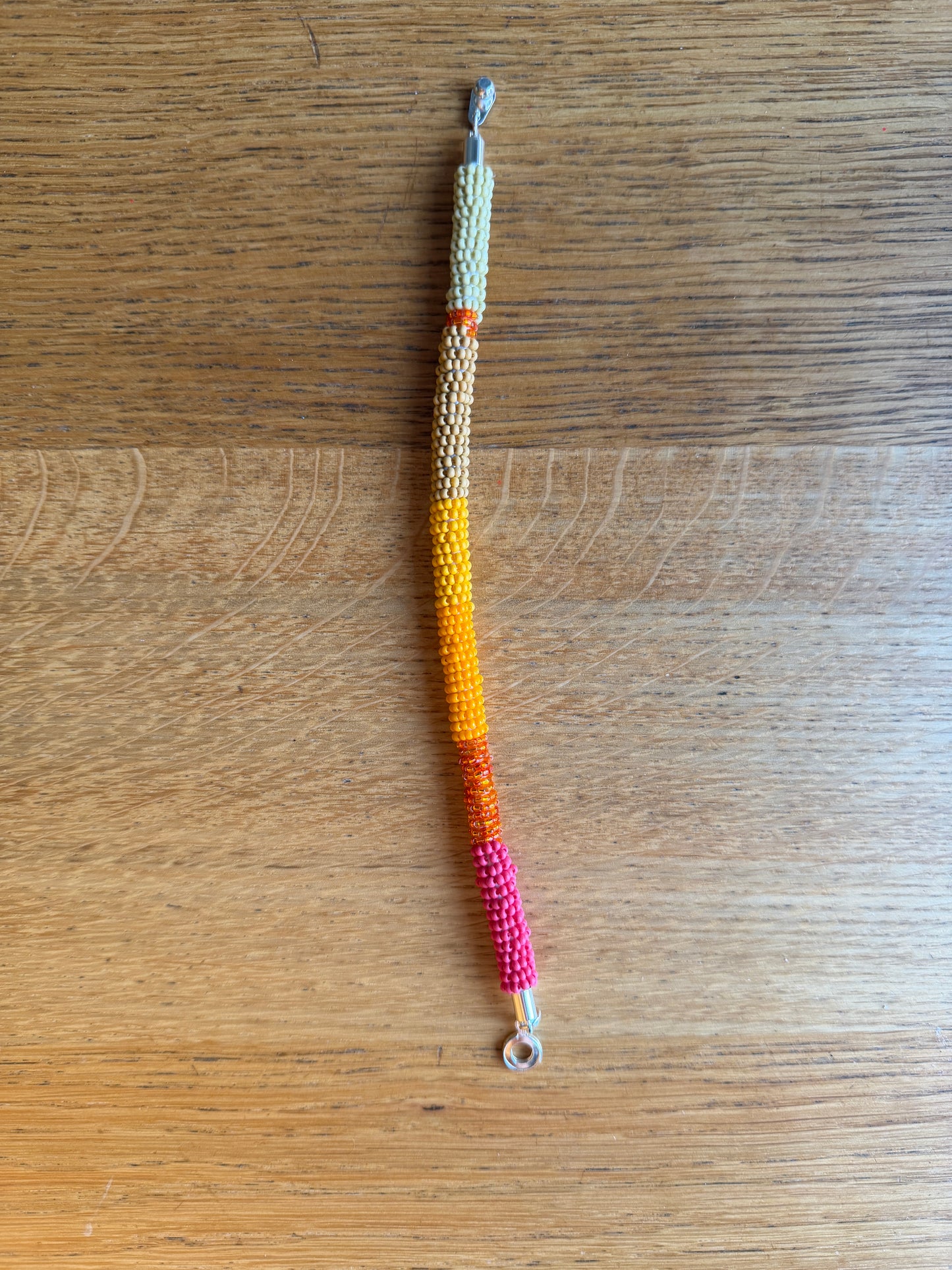 Bead rope bracelet - orange and pink