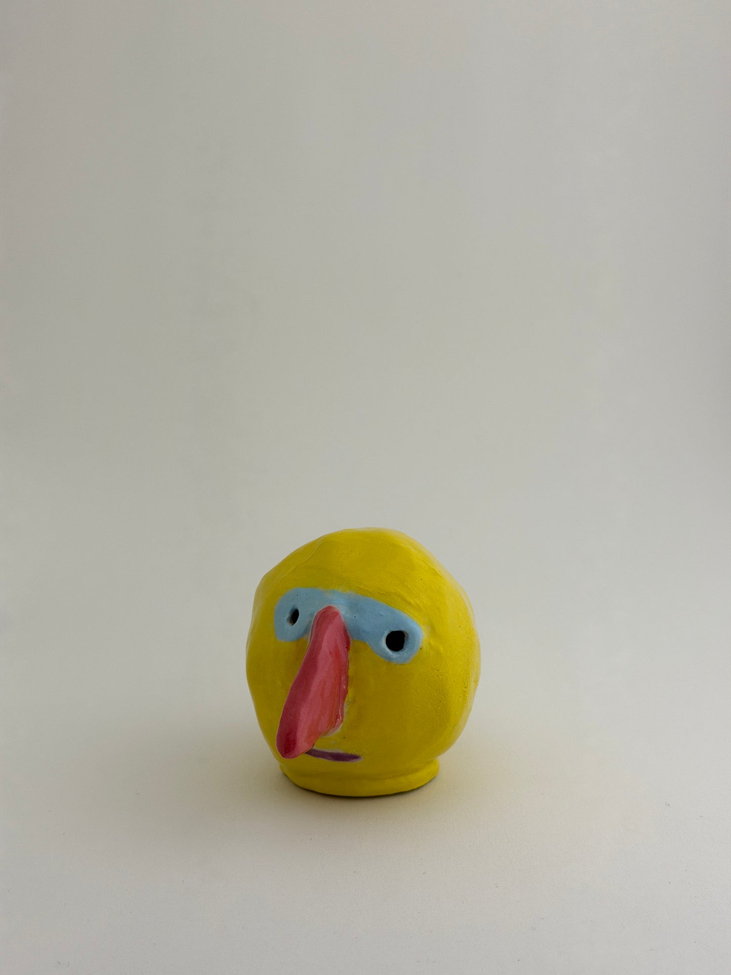 man with yellow head #5 (with glasses)