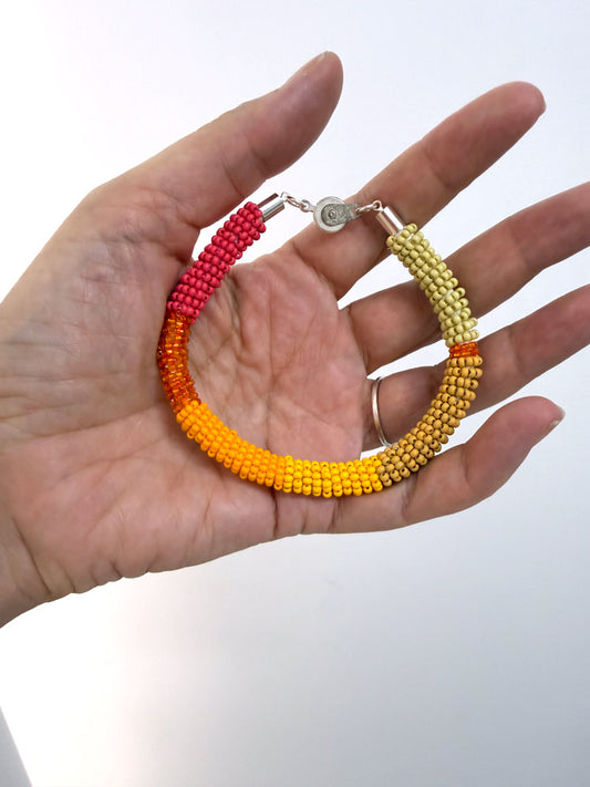 Bead rope bracelet - orange and pink